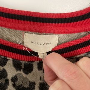 Leopard Print with Red and Black collar and sleeves